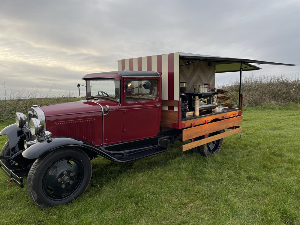 Wide side view of the coffee truck setup